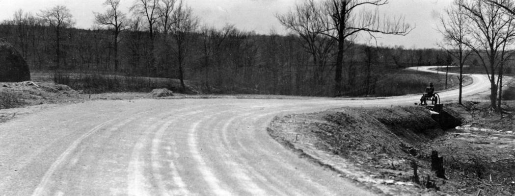 Project #250, Master Project #2784 District 6: Project #250, now a part of Master Project #2784, provided for the reconstruction of 4 miles of the Route Road and the Ferman Road in Jefferson County. View showing completed base course just prior to application of wearing surface, photographed April 13, 1936