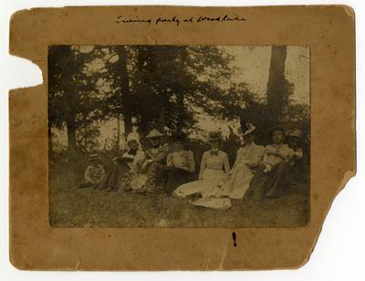 Swing party at Woodlake                                     Miss Elizabeth Brown, fourth from left? Elodie Helm third from right (verso)