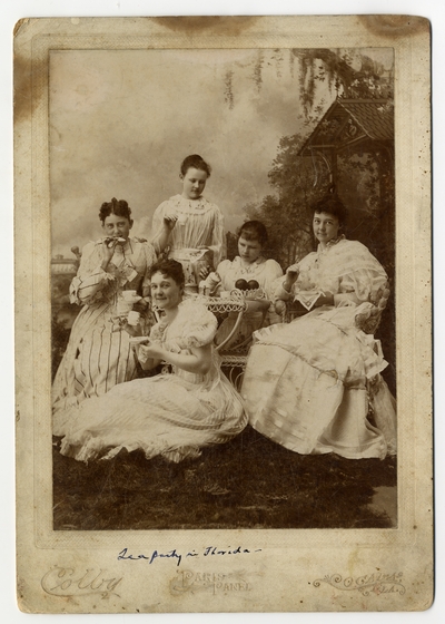 Tea Party in Florida, Elodie Helm in front, Katherine Helm on right,                                  Please return to Mrs. B H Helm Lexington Ky (verso)