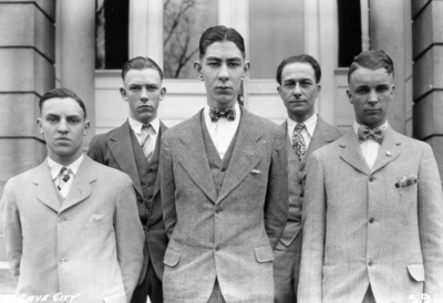 Unidentified individuals from Cave City, Kentucky visiting the University, standing in front of Miller Hall