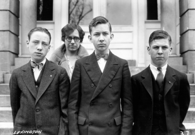 Unidentified high school students from Lexington, Kentucky visiting the University, standing in front of Miller Hall