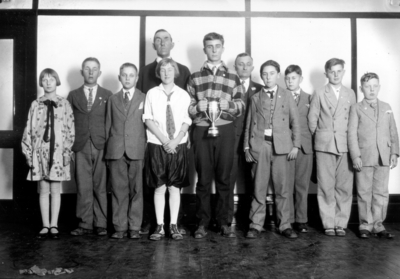 4-H Students and a teacher from Kentucky rural schools during Rural School Week, won a trophy