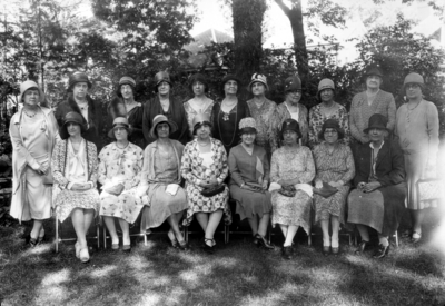 University of Kentucky Women's Club, includes Mrs. Norm J. Carrel, front second from right; Mrs. Gillis, and Mrs. Lafferty, in back