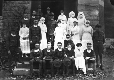 Nurses, Captain Royden, and medical officers; nurses in Gymnasium Hospital During influenza epidemic