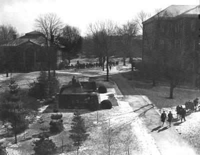 First location of Patterson statue with Carnegie Library (this building was razed in 1967 to build White Hall Class room Building) in the left foreground and Miller Hall in the right