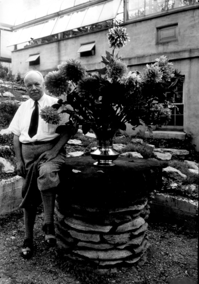 Dean F. Paul Anderson with Dahlias