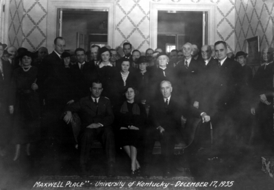 Group at Maxwell Place seated on couch from left to right, Governor A. B. 