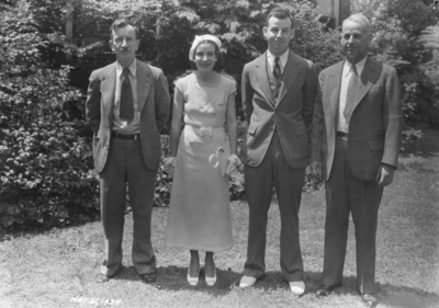 Louis E. Nollau and Hazel, his daughter with two unidentified persons