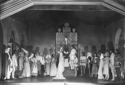 Actors in medieval costume performing in 