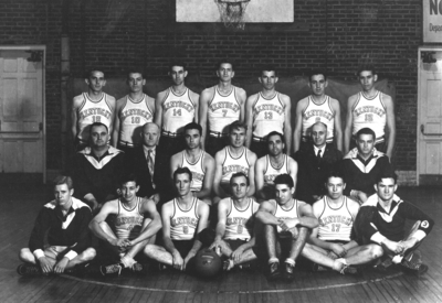 Men's varsity basketball team, Coach Adolph Rupp second row on left