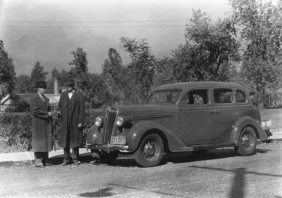 Two men and a car