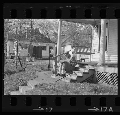 Elderly man porch