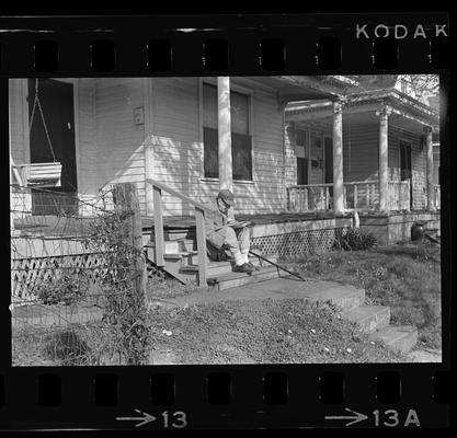 Elderly man on porch