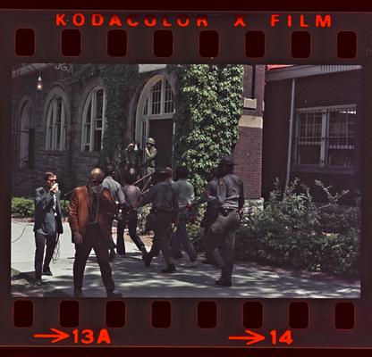 Soldiers and people in front of Buell Armory