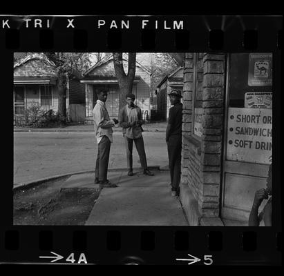 Man and child, Three men on corner