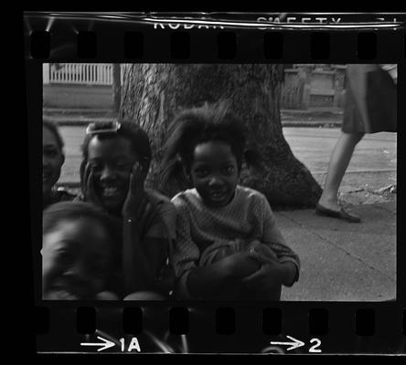 Four children, Man and child on porch