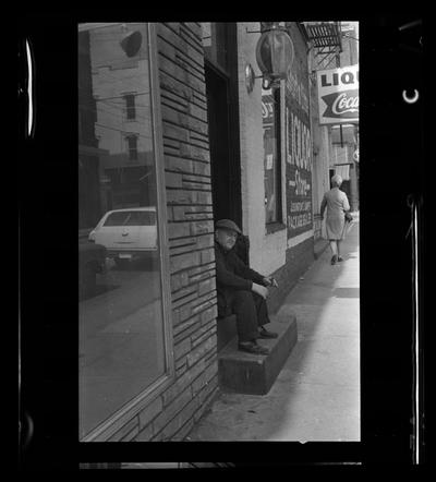 Man on stoop