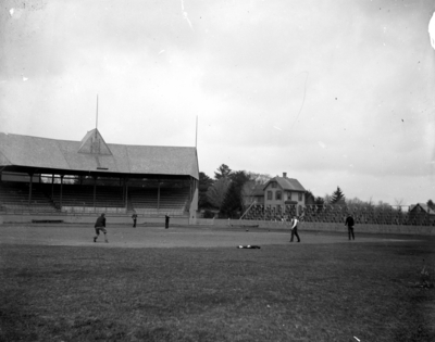 a group of men playing baseball