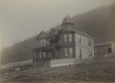 Unidentified women on the porch of an unidentified house