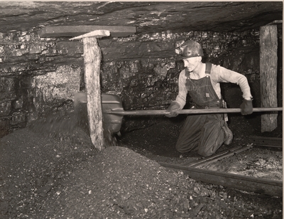 Harry Fain, coal loader, removes 