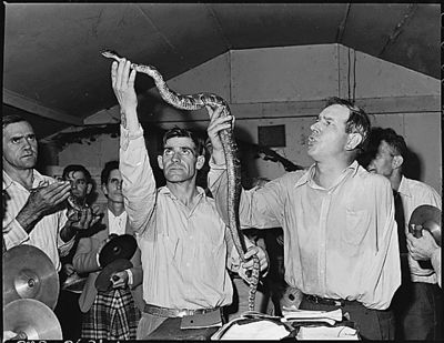 Handling serpents at the Pentecostal Church of God.  Company funds have not been used in this church and it is not on company property.  Most of the members are coal miners and their families.  Lejunior, Harlan County, KY. 9/15/46