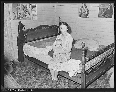 Mrs. Walter Rose, wife of miner, and her baby.  The baby probably has rickets and has never had any food other than powdered milk although he is ten months old.  The company doctor has not given her any instructions as to feeding and care of the child.  Welch, McDowell County, W. Va.8/10/46