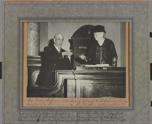 Governor Laffoon handing gavel to Laura Clay as Temporary Chairman of the Kentucky Convention to ratify the 21st Amendment to the Constitution. Miss Clay's acceptance address is written on the back of the photograph