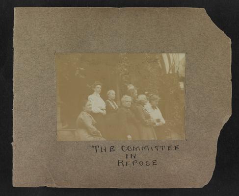 Handwritten title on album page: The Committee in Repose