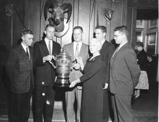 Group receiving a trophy