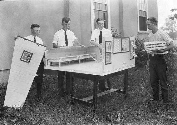 Students constructing a 4 - H project, poultry house