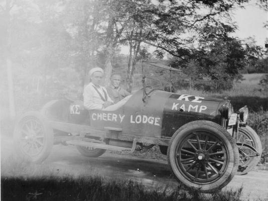 Kappa Sigma, a sailor and an unidentified in a sports car with 