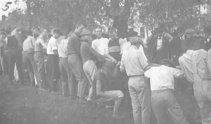 Student Tug-of-War at Clifton Pond, competition between freshman and sophomore classes, activity began in 1913 during Commencement festivities