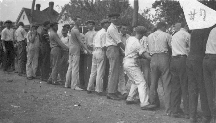 Student Tug-of-War at Clifton Pond, competition between freshman and sophomore classes, activity began in 1913 during Commencement festivities