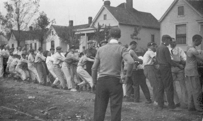 Student Tug-of-War at Clifton Pond, competition between freshman and sophomore classes, activity began in 1913 during Commencement festivities