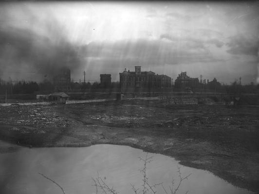 Barker Hall, Buell Armory, the Administration Building and other buildings in the distance, in foreground is dump