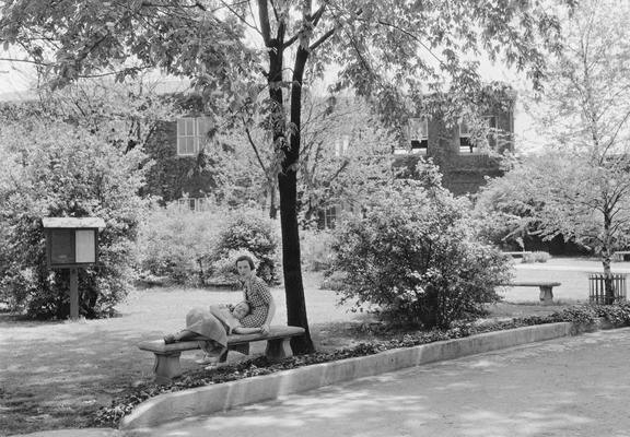 Two young women on a bench