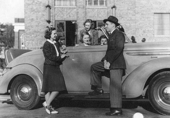 Students standing by a car, Student Union