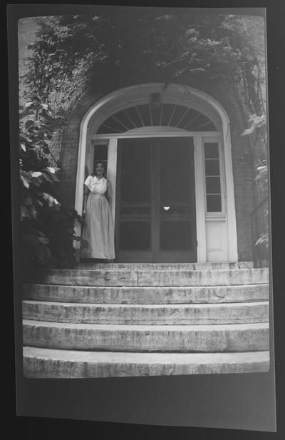 Doorway to the Trustees Office, Sister Sarah pictured, Shaker Village of Pleasant Hill, Kentucky in Mercer County