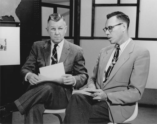 Dr. Ellis Hartford and another man on camera during taping of 