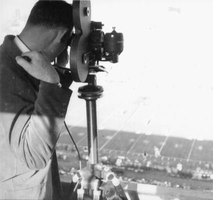 Ric Sanderson filming a football game at Stoll Field