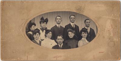 Group portrait of six young women and four young men, the class of 1903-04. The instructor was Prof. R.H. Ptton (business class). The names are on the back of the photo