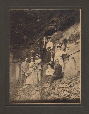 Five men and four women hiking, stop for a rest