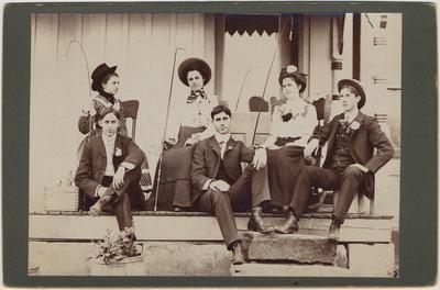 Group of three young men and three young women, sitting on a porch: Pearl Day, Mary Bereneman, Corda Benneman, George Ringe, Howard James and Ed D. Day