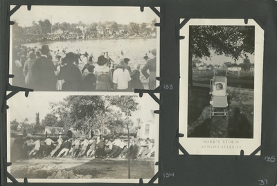 people in the water with a large amount of people watching from the shore; a large game of tug-a-war; 