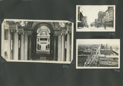 interior of building, very ornate; view of street; overhead view of street with buildings down both sides, and cars sign reads 