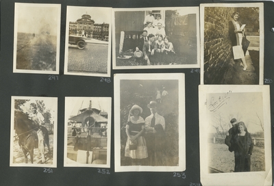 blurred photograph; building off in the distance with half of a car in front of it; a group photograph with men and women; a woman leaning against a building; a boy riding a horse; appears to be a picture of a ship; a woman and man standing together outside; 