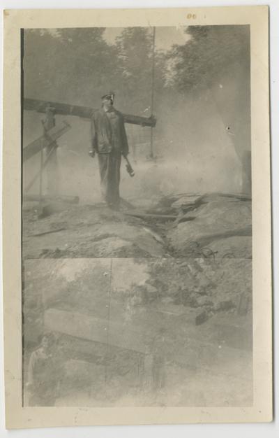 Unidentified workers standing near a drilling rig