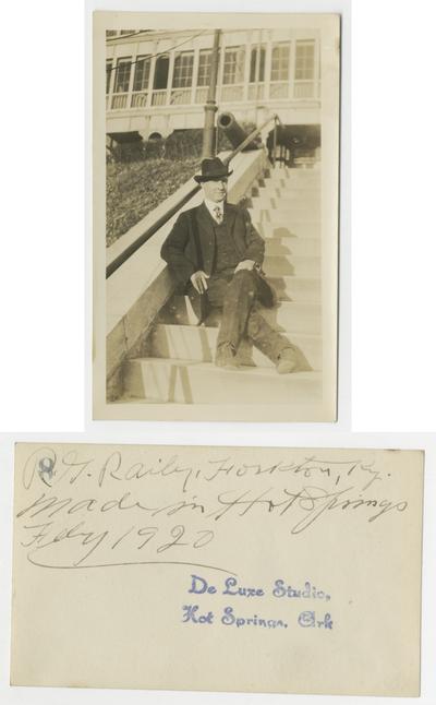 Rowland G. Railey sitting on steps