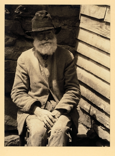 Old Man Miller; Wood Carver; Pine Log, North Carolina.  Elderly, bearded man in hat, coat, and ragged pants SAME AS 96PA100 #316