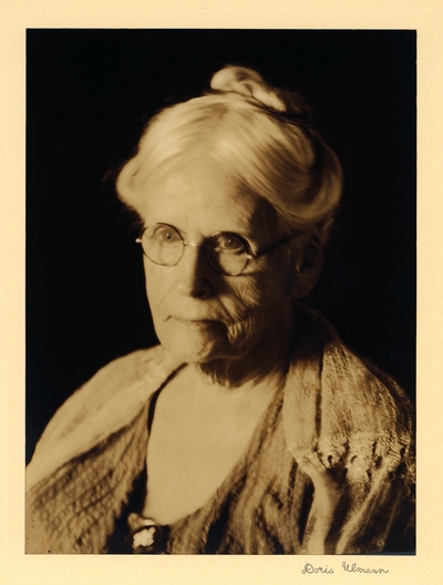 Mother of Sarah Blanding, of SC.  Head shot of elderly woman in glasses and shawl, with hair piled on top of her head